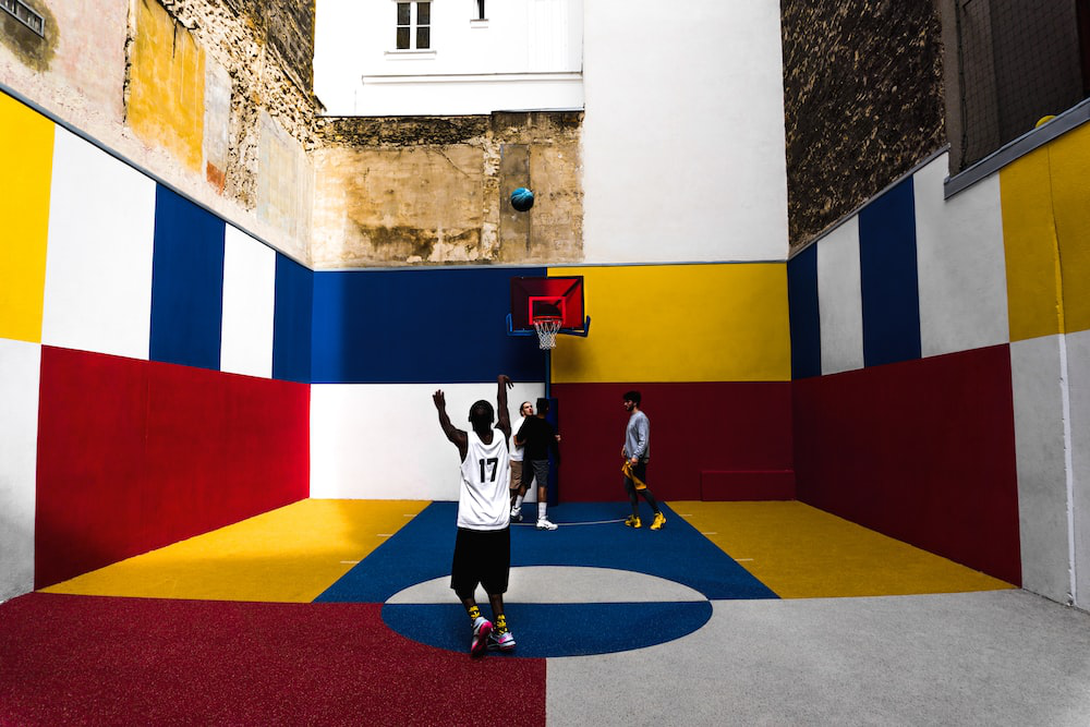 A colorful basketball court painted byresidential painters in CA