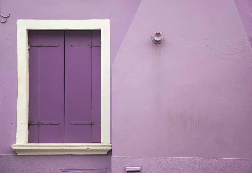 A purple wall paintedbycommercial painters in Orange County.