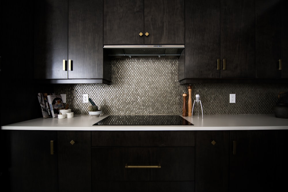 A dark kitchen painted by commercial painters in Orange County
