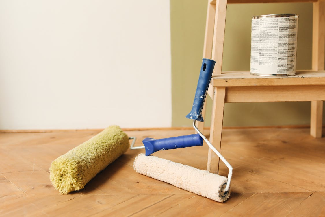 a floor with paint rollers.