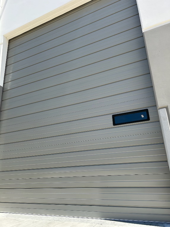 a professionally painted commercial garage door