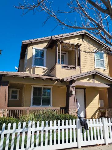 A newly painted home showcasing a refreshed and vibrant exterior after a professional residential painting job.