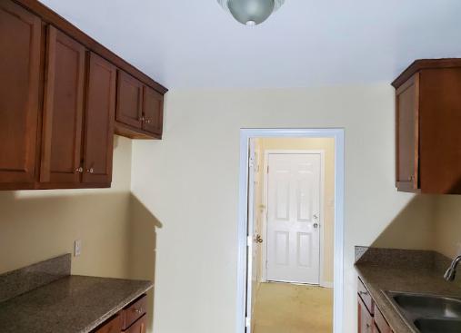 Freshly painted kitchen walls in soft, neutral tones, creating a modern and inviting atmosphere.