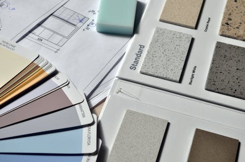 A standard color book showing various paint shades used for commercial painting and interior design.