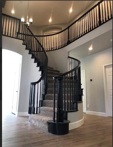 an interior space with wooden floors.