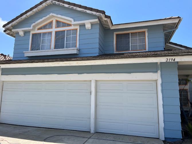 a house’s exterior painted blue.