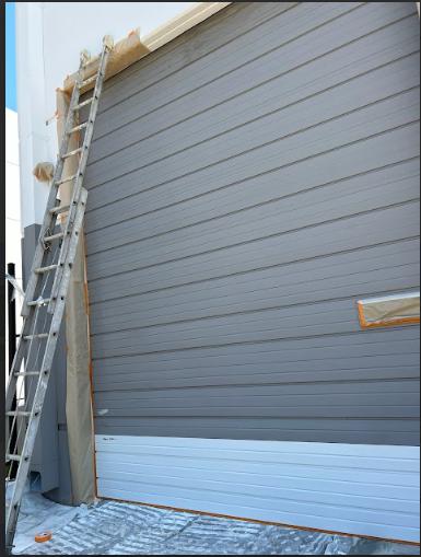 a door painted in an earthy hue.