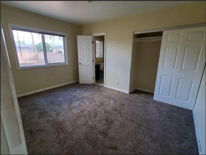 a room with carpeting.