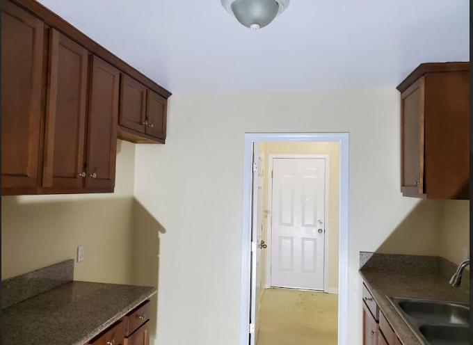 a home’s interior with wooden cabinetry