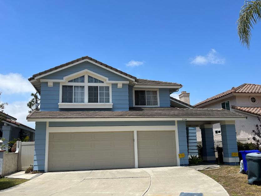 A house with blue exterior painting