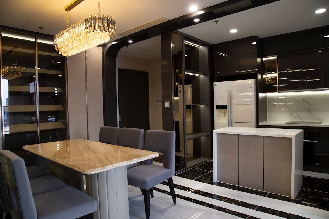 a room with a petite chandelier.