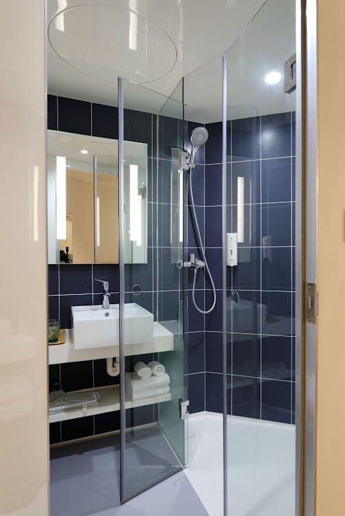 blue tiles in a bathroom.
