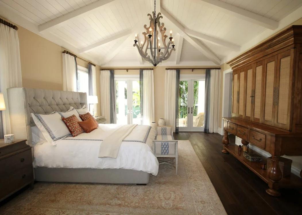 cozy bedroom décor with a petite chandelier.