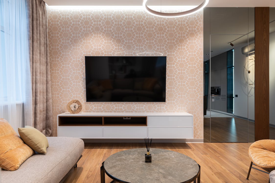 a room’s interior with textured wallpaper.