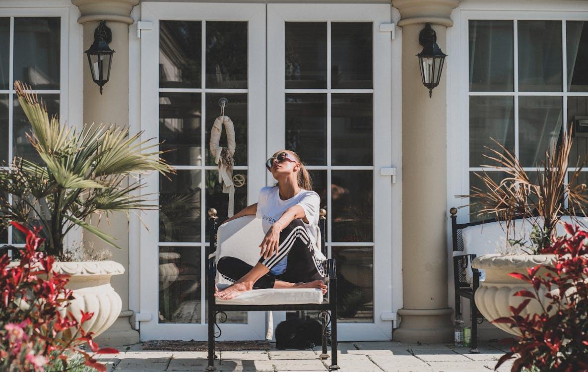 a woman sitting outside.