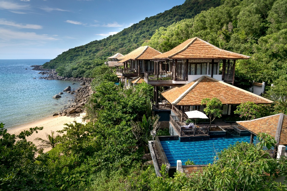 Visually pleasing beach house surrounded by greenery