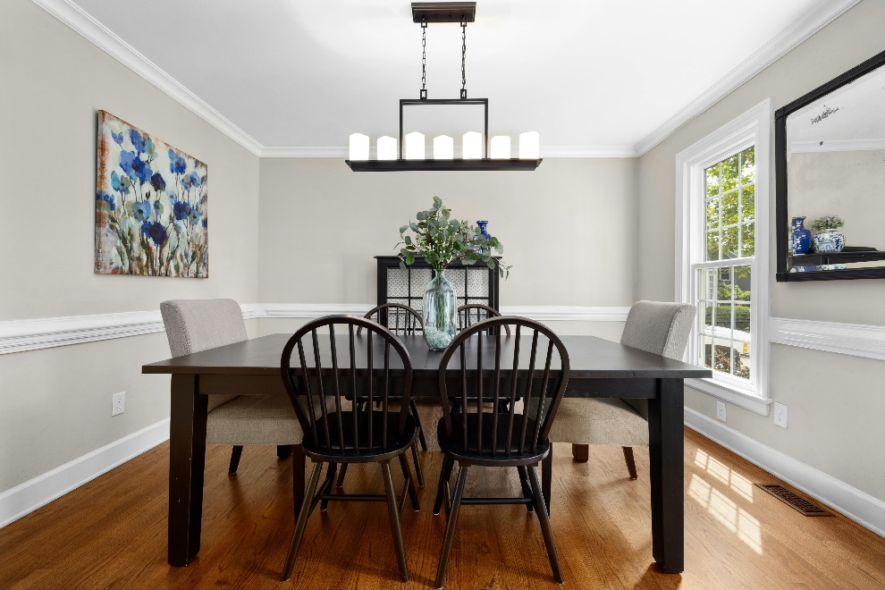 Chandelier hanging over a dining table 