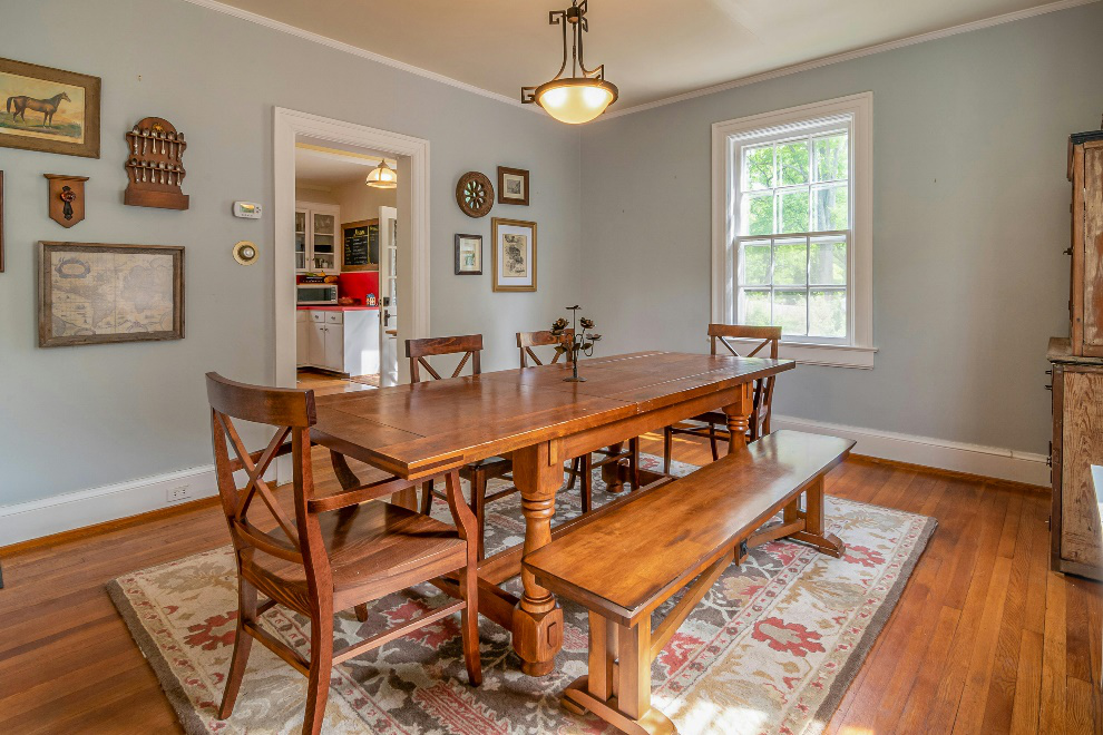Chandelier hanging over a dining table 