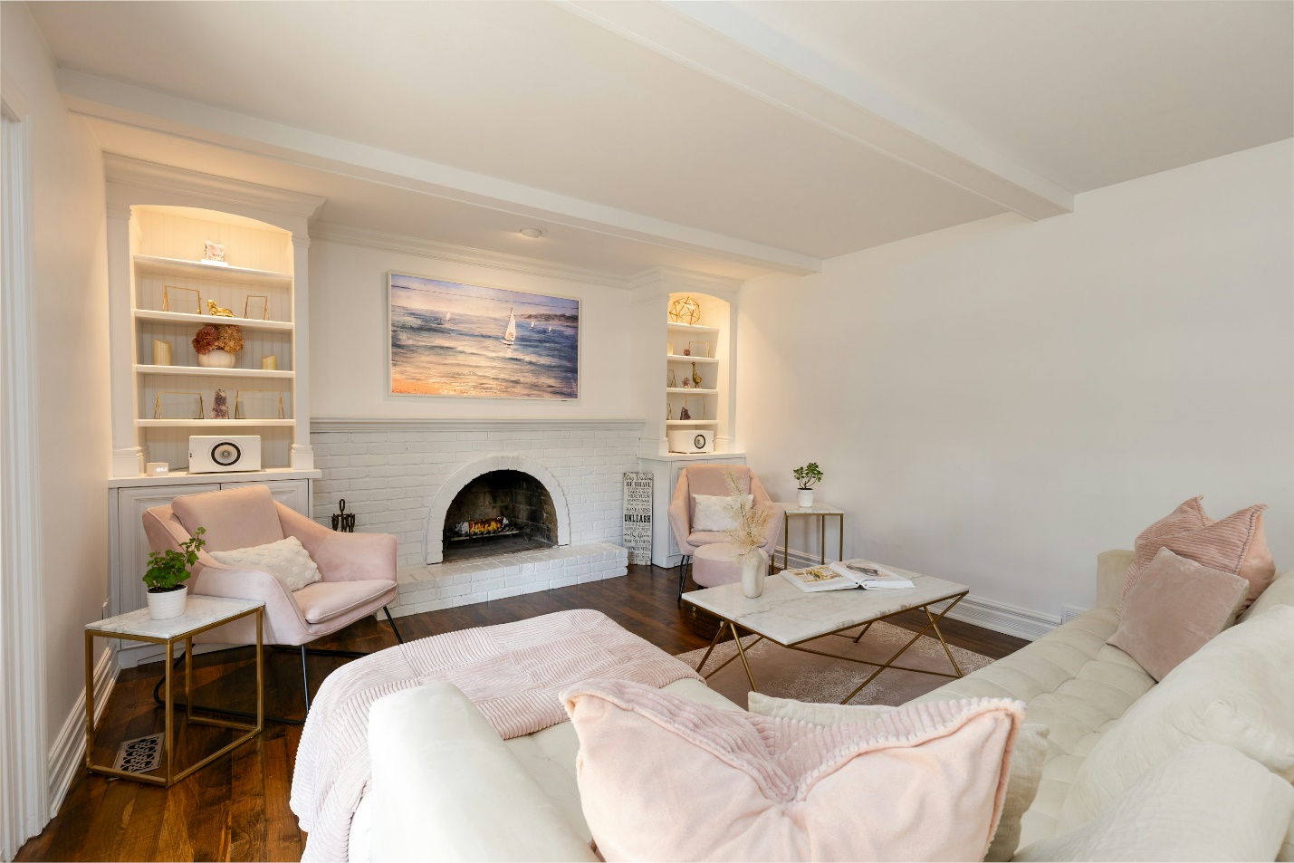 Elegant living room featuring white satin-finish walls, showcasing a clean and modern interior painting result.