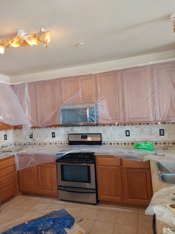 a kitchen about to be painted.